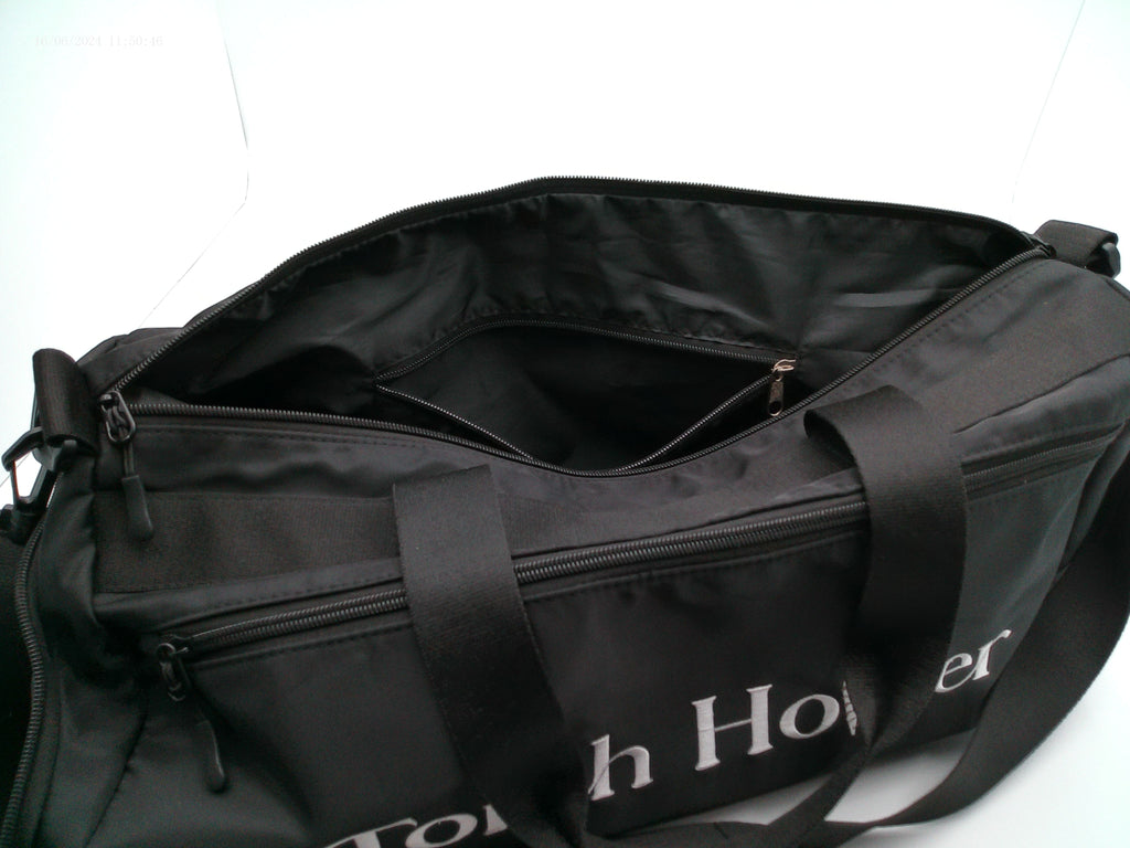 Opened Zippers on a Black duffel bag with 'Touch Holder' branding on a white background